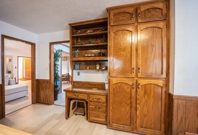 a view of a entryway with wooden floor