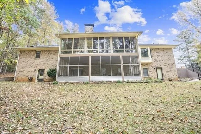 a large brick building with a view of house
