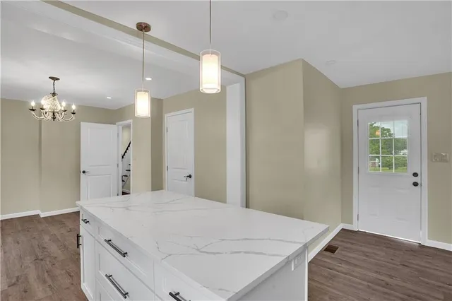 a bathroom with a sink vanity and a mirror