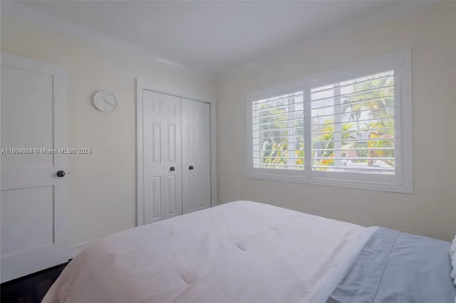 a bathroom with a tub a sink and a shower