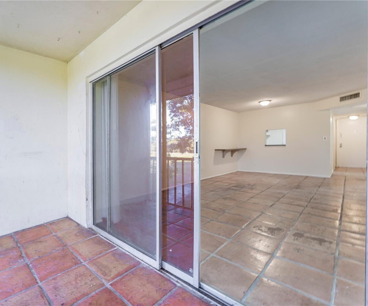 7911 North Colony Circle, Unit 305 Tamarac, FL 33321 - Photo 21 of 49 a view of empty room