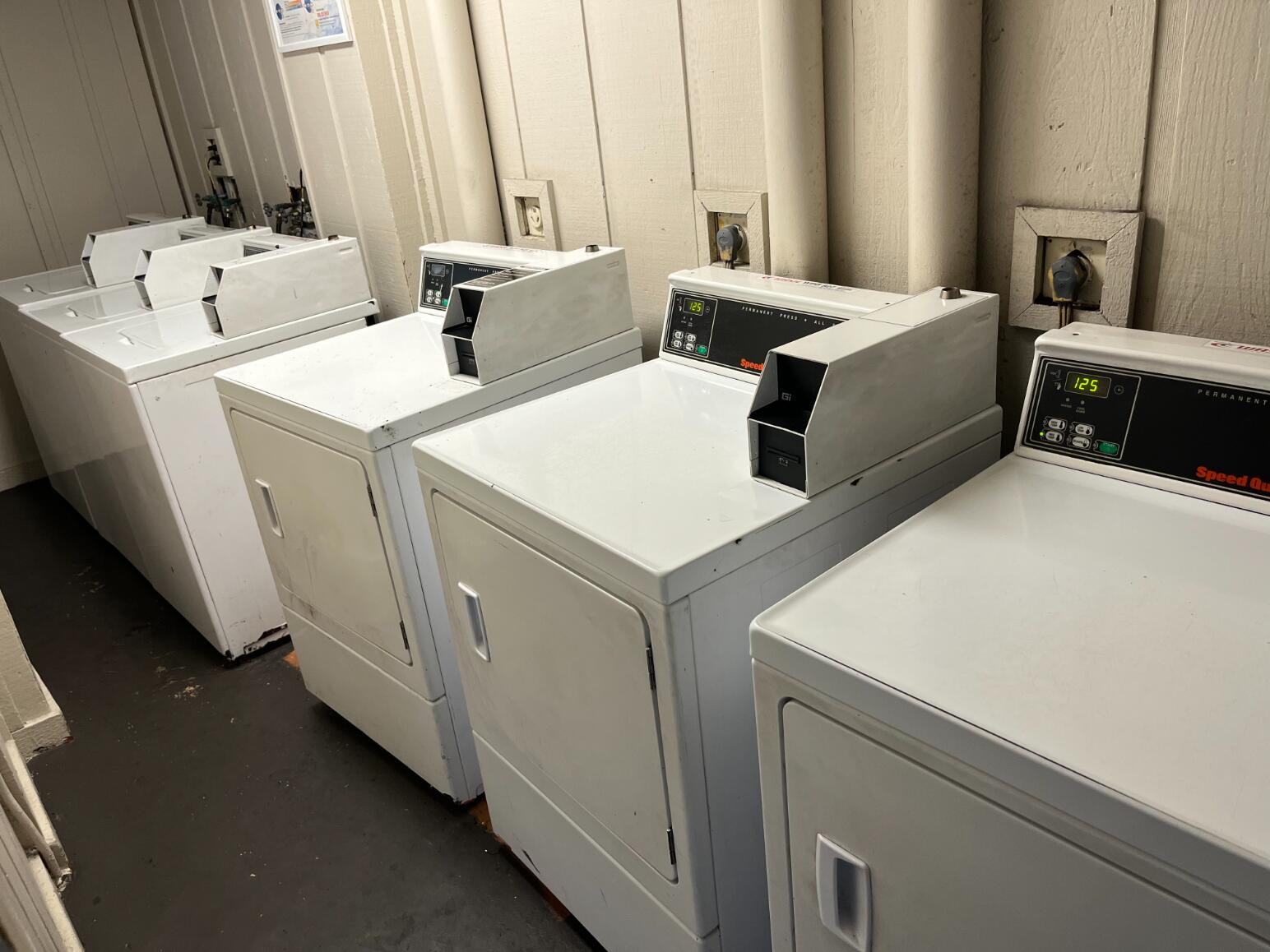 7911 North Colony Circle, Unit 305 Tamarac, FL 33321 - Photo 46 of 49 a utility room with dryer and washer