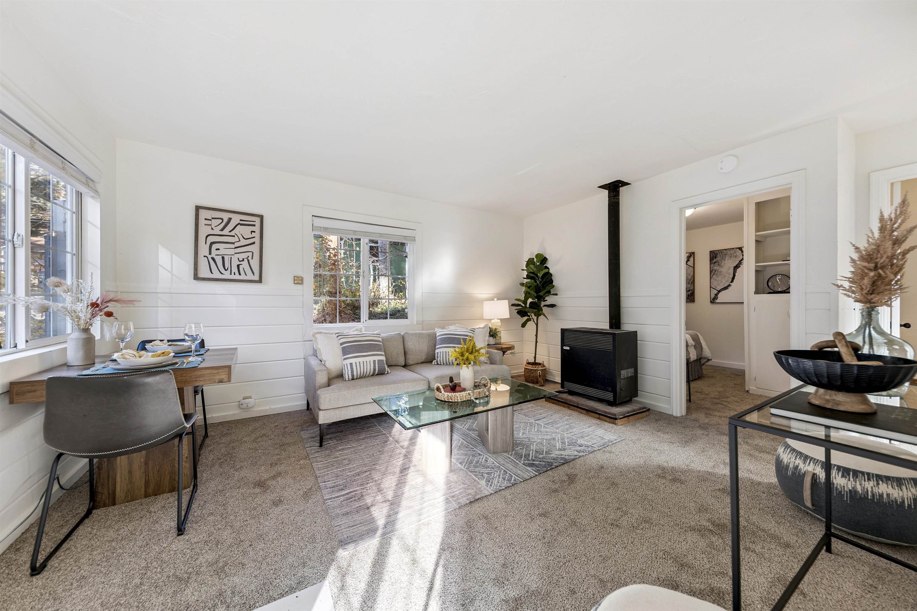 13607 Moraine Road Truckee, CA 96161 - Photo 13 of 28 a living room with furniture and a potted plant