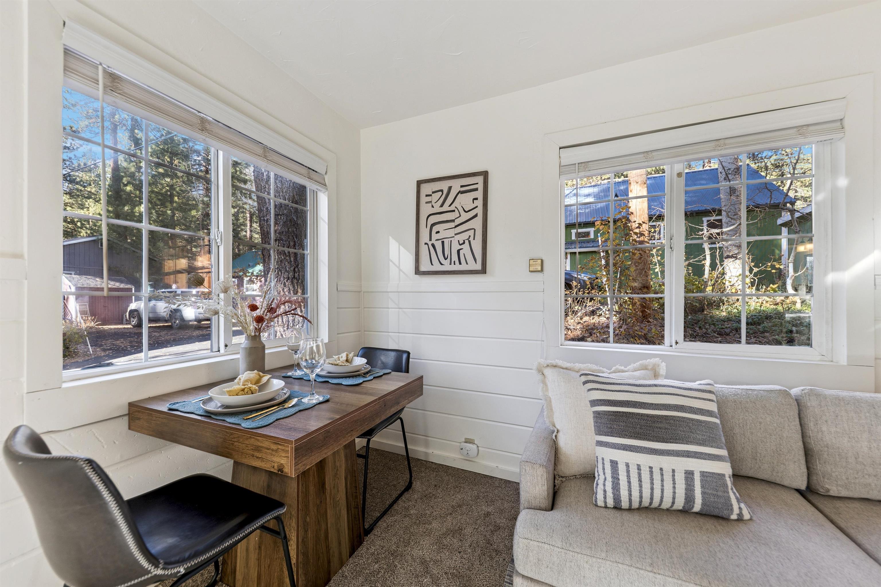 13607 Moraine Road Truckee, CA 96161 - Photo 15 of 28 a view of a dining room with furniture window and outside view