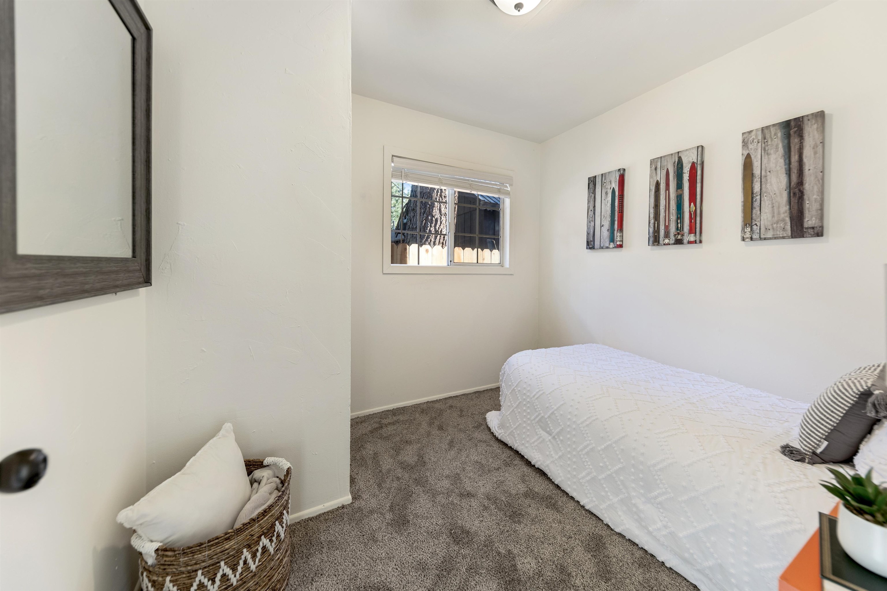 13607 Moraine Road Truckee, CA 96161 - Photo 22 of 28 a bedroom with a bed and a chair