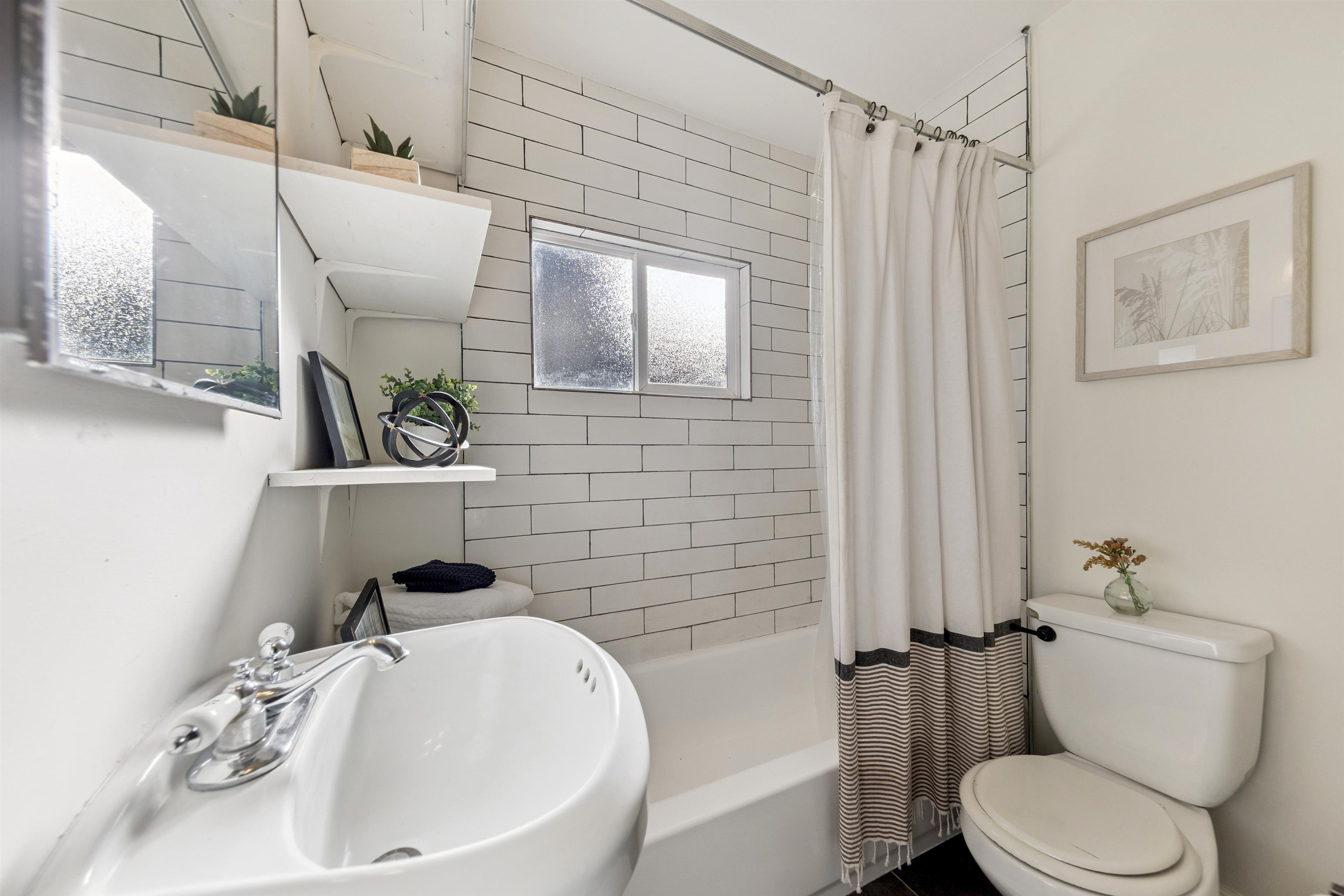 13607 Moraine Road Truckee, CA 96161 - Photo 23 of 28 a bathroom with a sink a toilet and shower