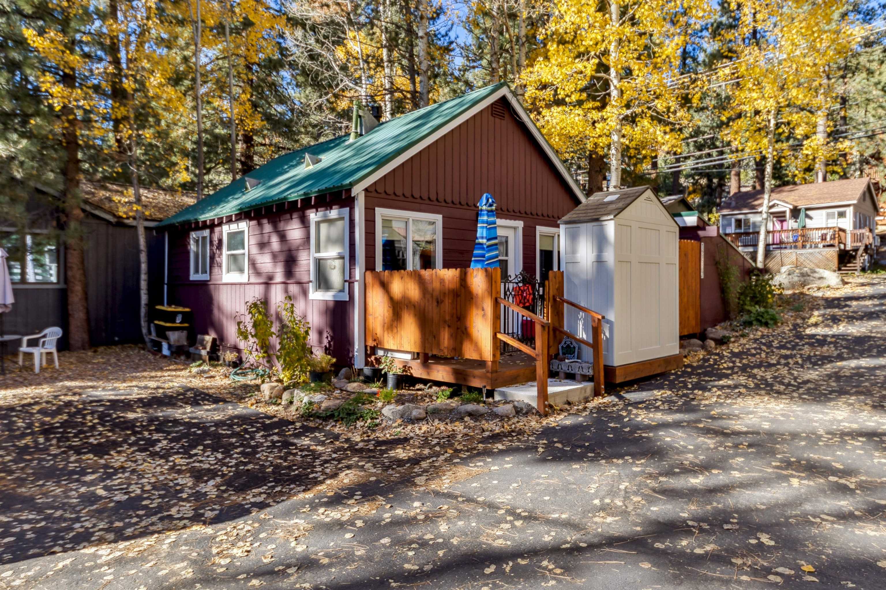 13607 Moraine Road Truckee, CA 96161 - Photo 9 of 28 a view of a blue house with yard and windows