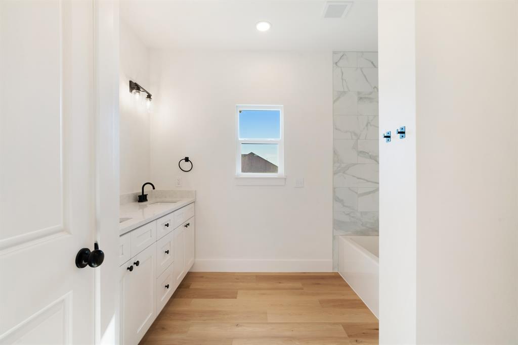 213 Private Road Sumner, TX 75486 - Photo 13 of 19 a view of an entryway with wooden floor