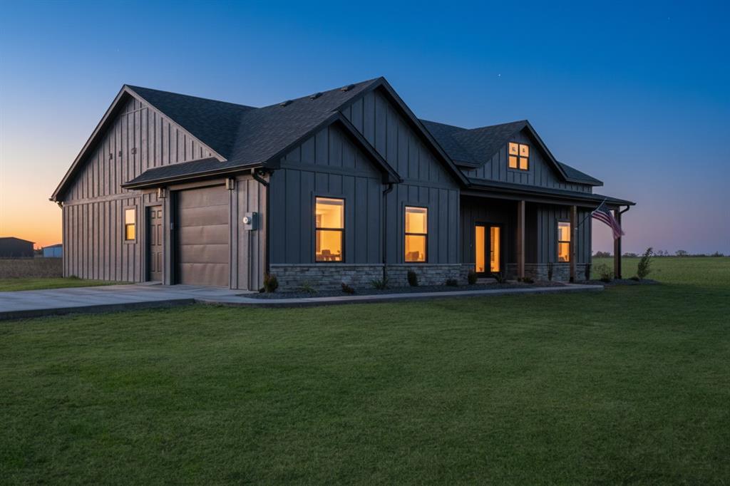 213 Private Road Sumner, TX 75486 - Photo 20 of 20 a front view of a house with a garden