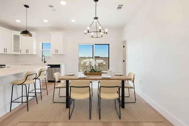 a view of a dining room with furniture
