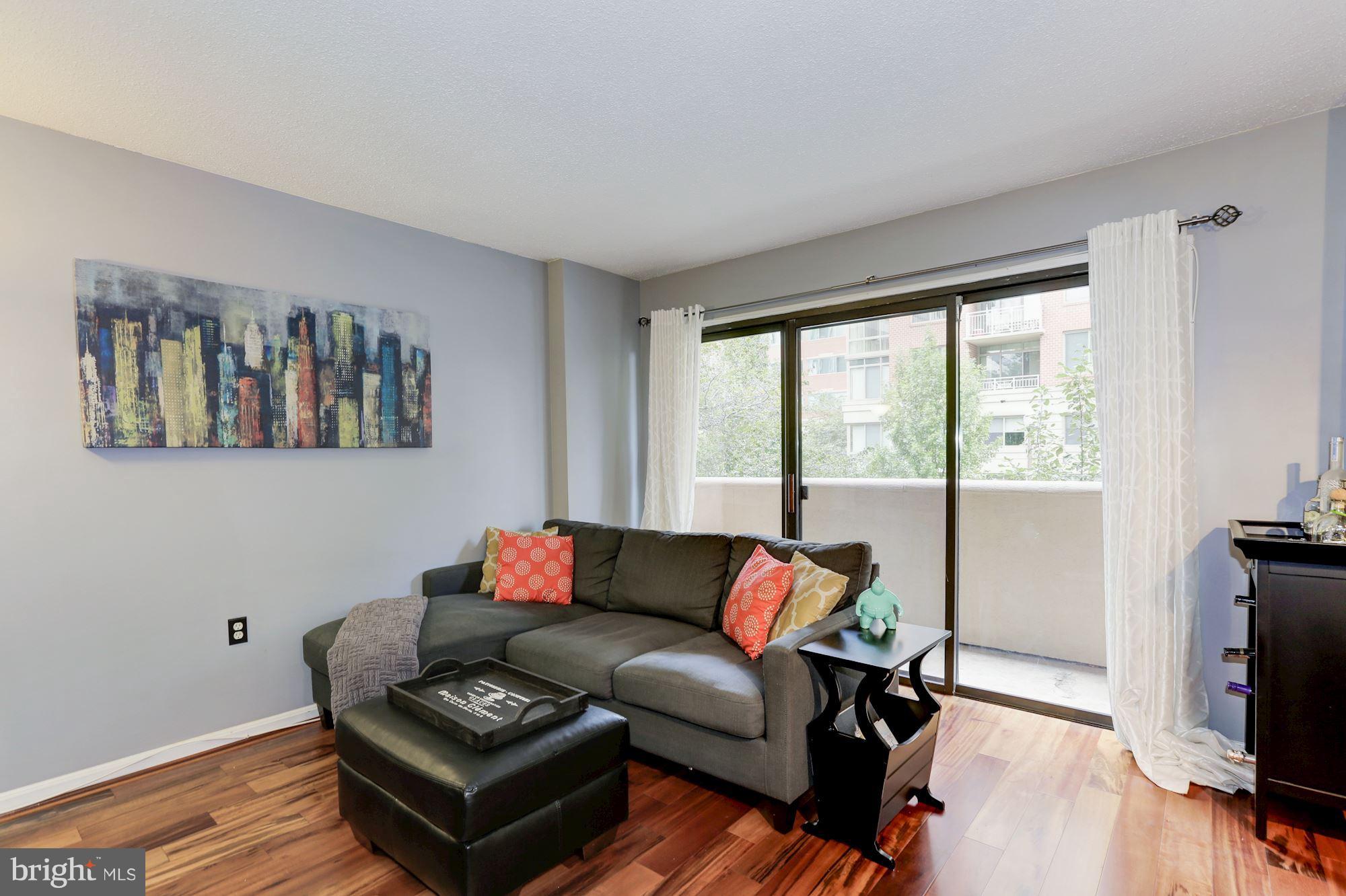 1301 North Courthouse Road, Unit 616 Arlington, VA 22201 - Photo 6 of 30 Floor to ceiling sliding doors for extra light