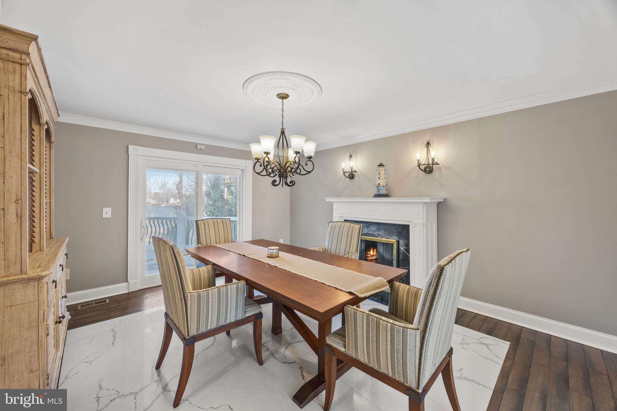 415 Edgewater Road Pasadena, MD 21122 - Photo 6 of 36 Dining room with fireplace
