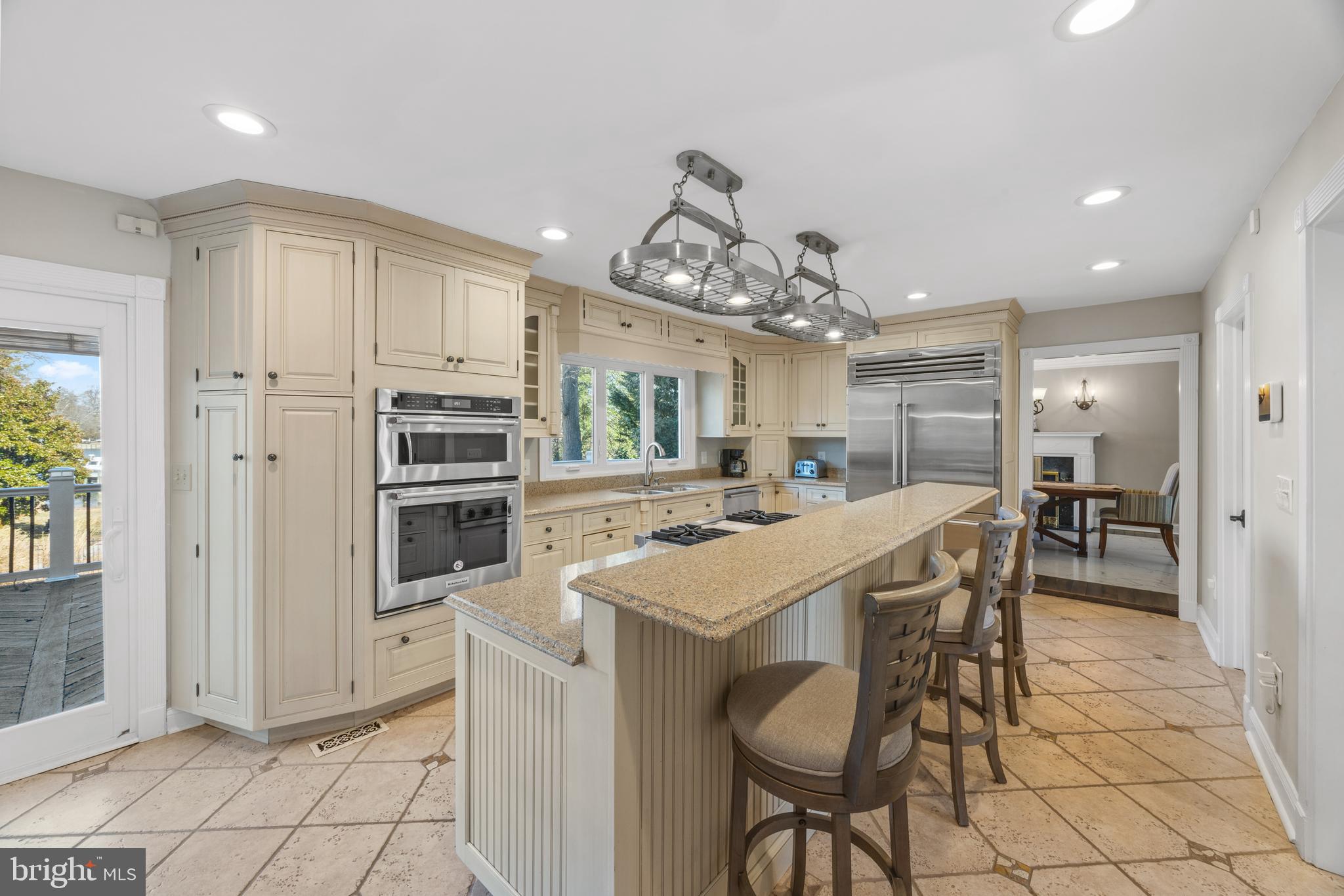 415 Edgewater Road Pasadena, MD 21122 - Photo 8 of 36 High end appliances and island with seating