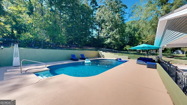 a living room with furniture and a table