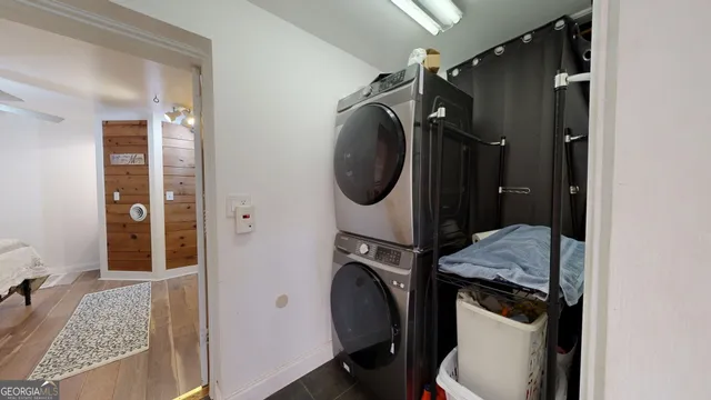 a view of a house with swimming pool and sitting area