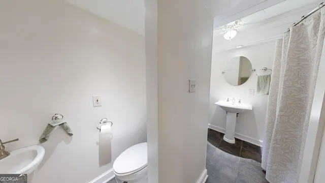 a view of a garage with parked cars