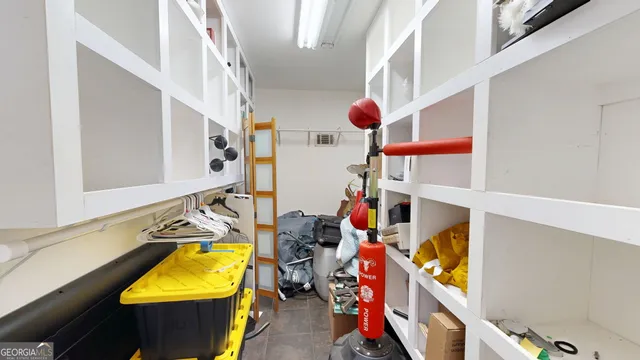 an aerial view of house with yard swimming pool and outdoor seating