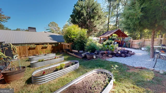 a view of sitting area in front of house