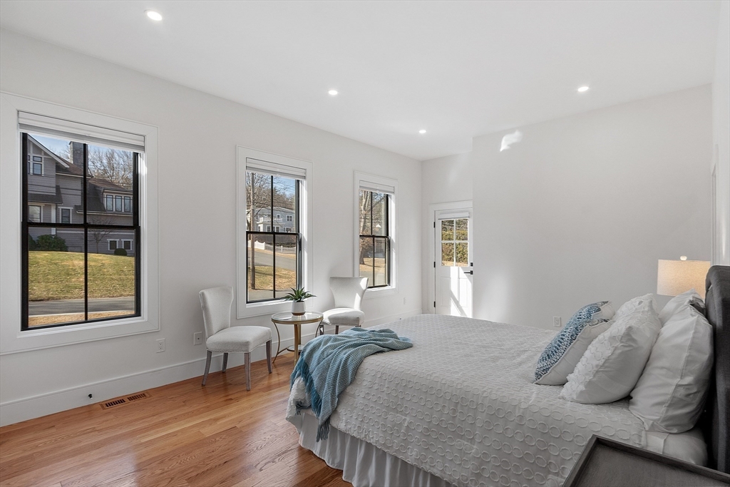 38 Webster Road Lexington, MA 02421 - Photo 16 of 42 a bedroom with bed and a window