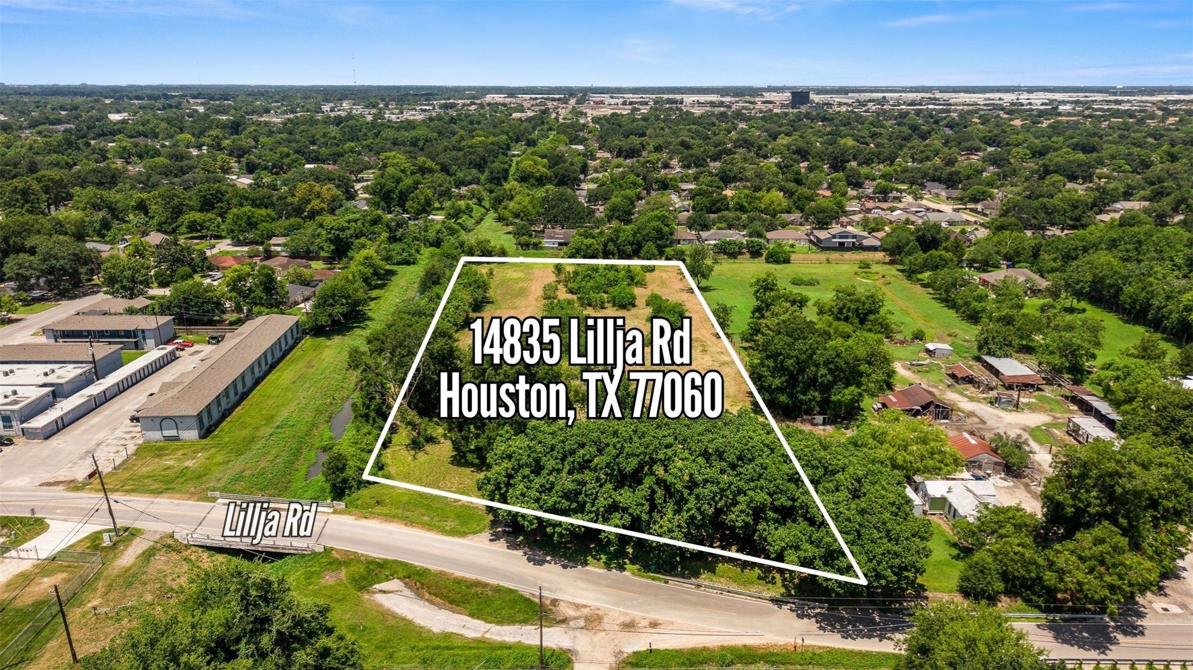 14835 Lillja Road Houston, TX 77060 - Photo 8 of 16 Facing west toward I-45, this aerial highlights the property's convenient location, offering easy access while maintaining the space and flexibility of unrestricted acreage.