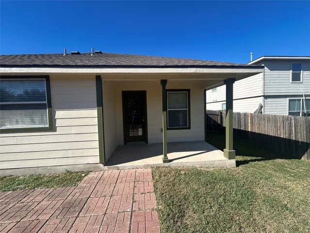 a view of balcony with floor to ceiling windows