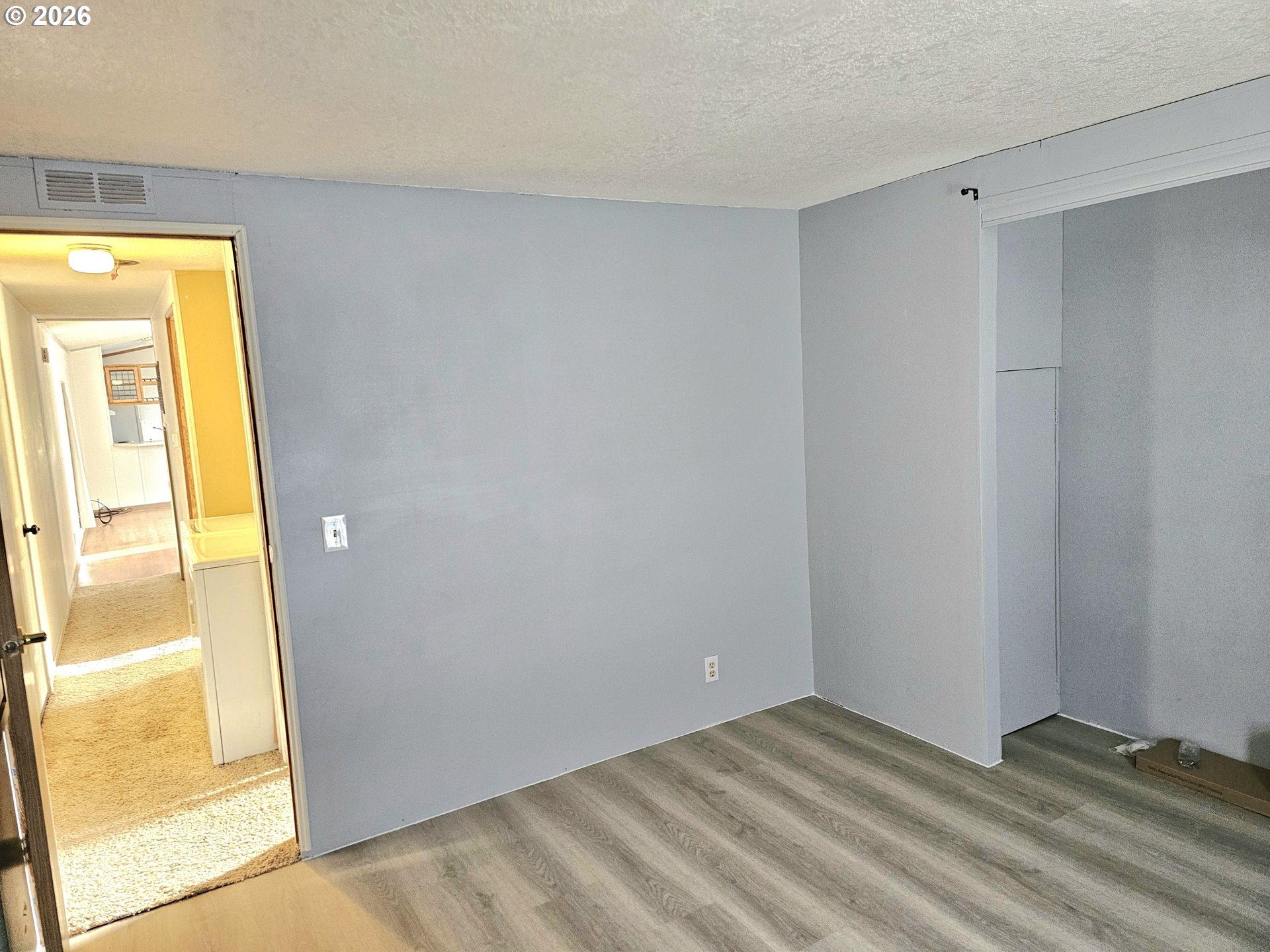 612 North Cascade Drive, Unit 25 Woodburn, OR 97071 - Photo 13 of 17 a view of an empty room and window