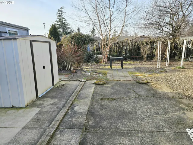 a backyard of a house with lots of green space