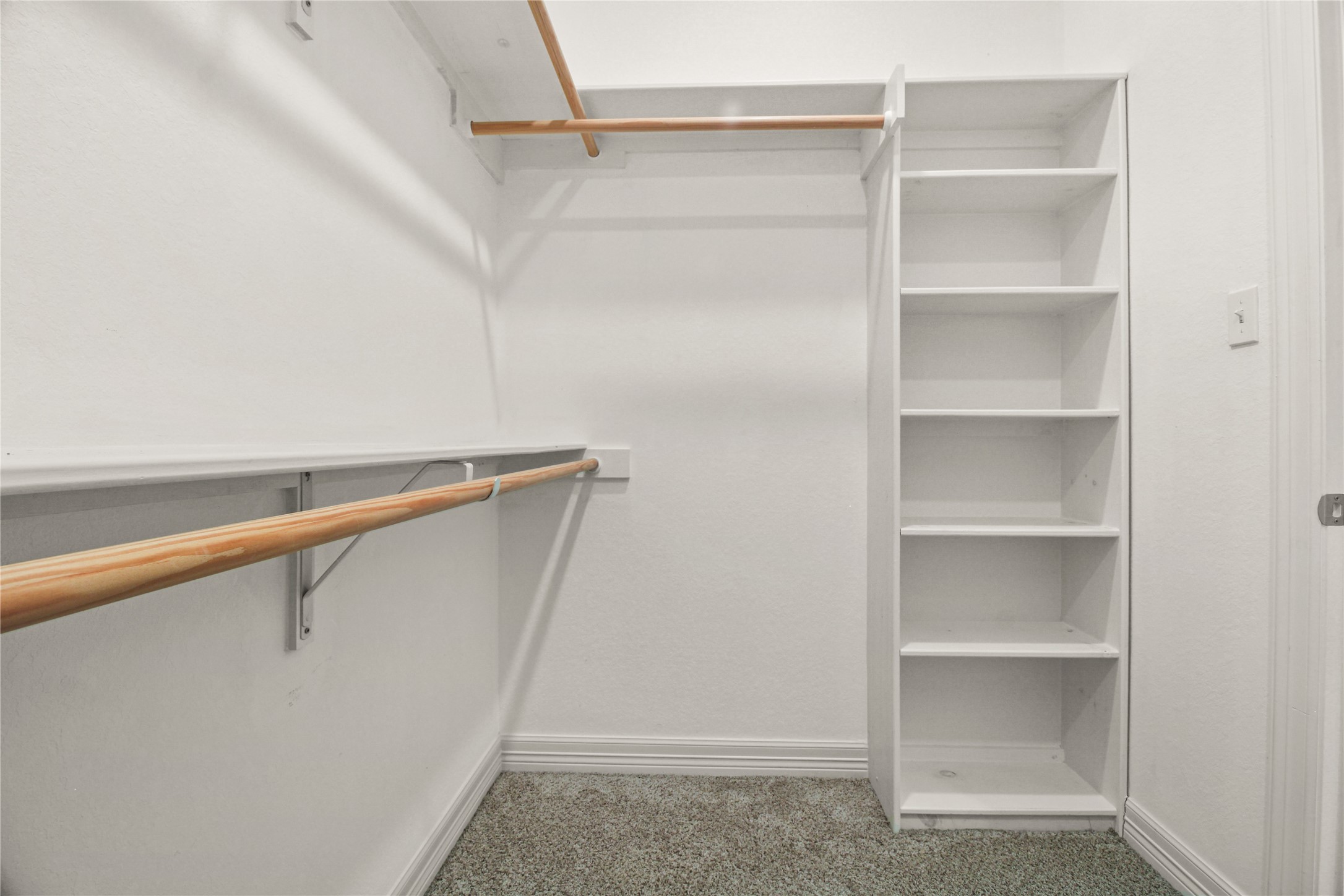 1208 East Henderson Road Angleton, TX 77515 - Photo 16 of 29 a view of an empty walk in closet