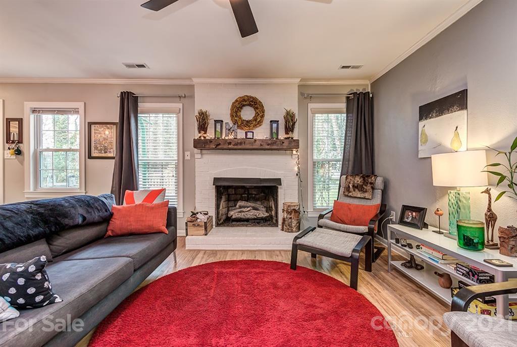 9638 Watergate Road Charlotte, NC 28270 - Photo 13 of 25 a living room with furniture and a fireplace