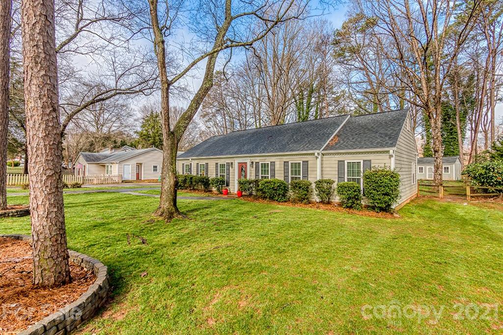9638 Watergate Road Charlotte, NC 28270 - Photo 3 of 25 a front view of a house with a yard