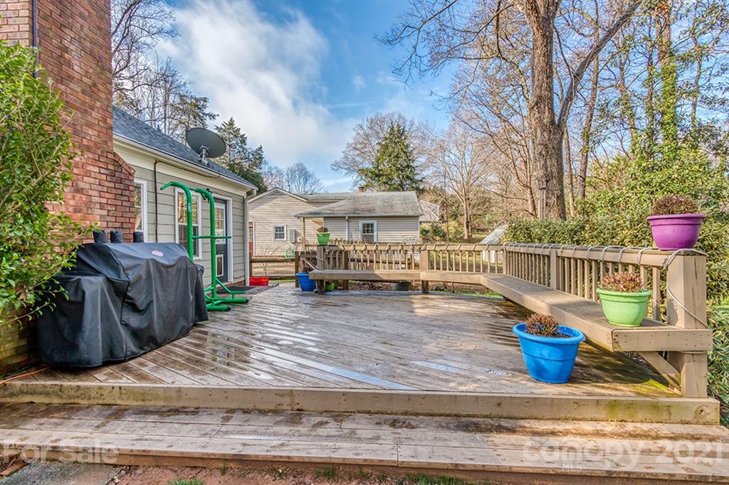 9638 Watergate Road Charlotte, NC 28270 - Photo 23 of 25 a view of a deck with chairs and plants