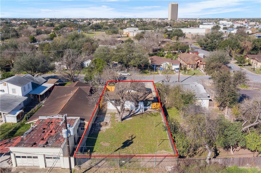 309 South 4th Street McAllen, TX 78501 - Photo 20 of 21 an aerial view of a house with a yard