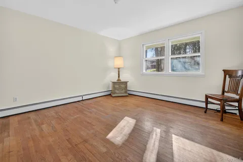 a view of livingroom with furniture and window