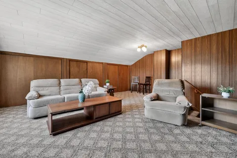 a living room with furniture and a couch