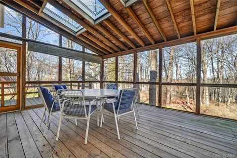 a dining room with wooden floor