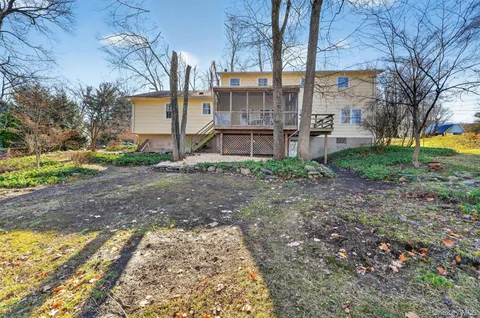 a view of a building with a yard