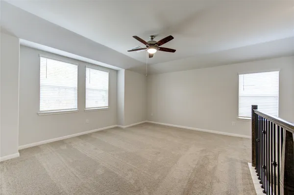 a view of a livingroom with a ceiling fan