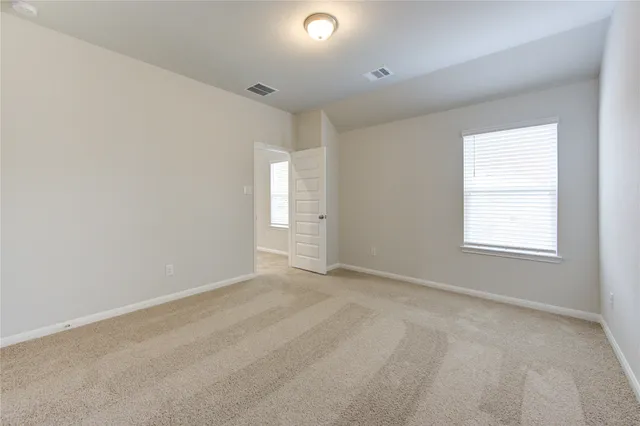 an empty room with an entryway