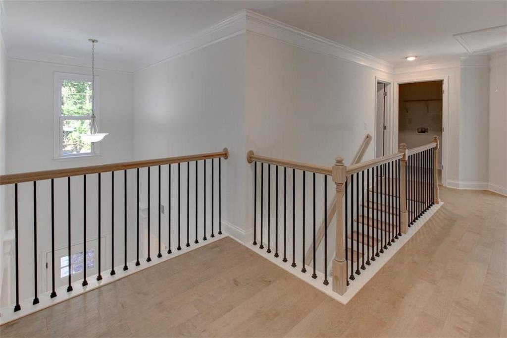 41 Woodland Road Covington, GA 30016 - Photo 21 of 35 a view of a hallway with stairs