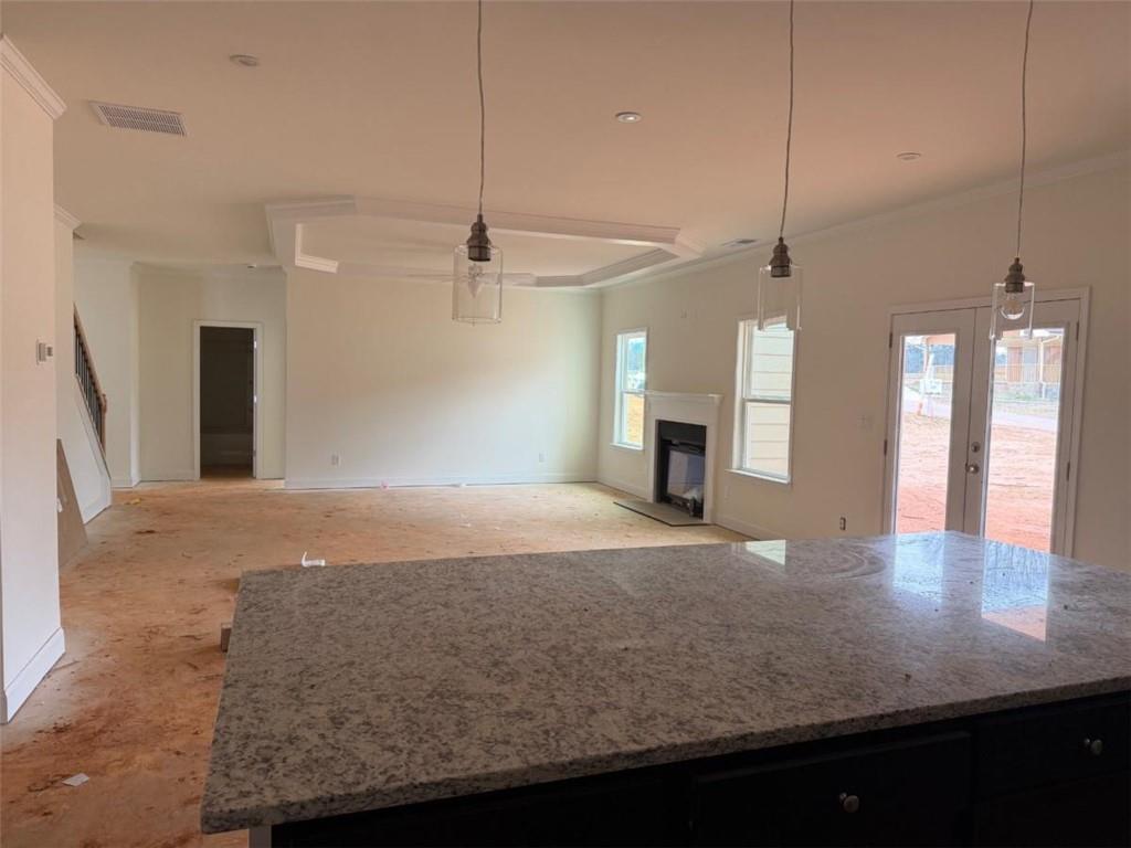 41 Woodland Road Covington, GA 30016 - Photo 4 of 35 a view of a kitchen and living room