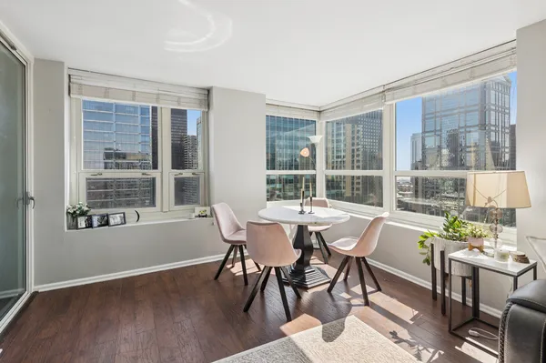 a view of a dining room with furniture window and outside view