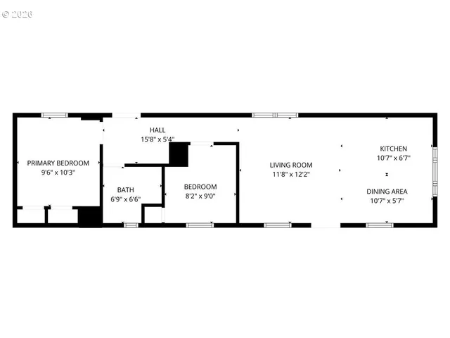 a view of a patio with a table and chairs