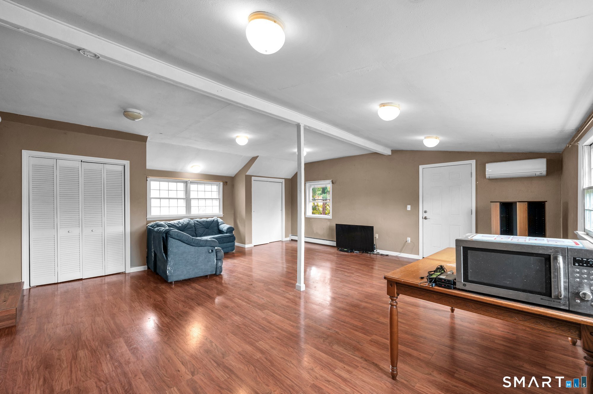 1105 Northrop Road Wallingford, CT 06492 - Photo 18 of 34 Huge Family Room upstairs which also includes a separate entrance