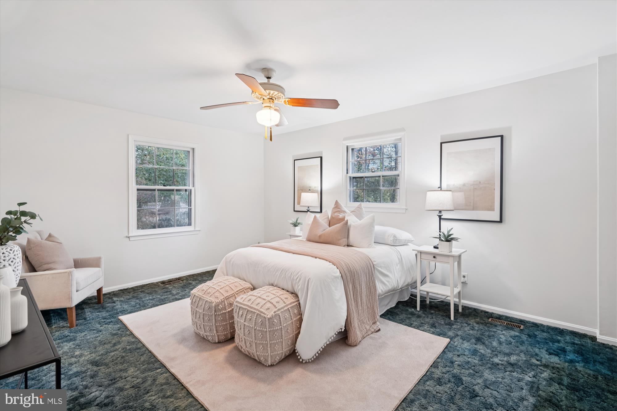 1912 Kimberly Road Silver Spring, MD 20903 - Photo 20 of 45 a bedroom with a bed and wooden floor