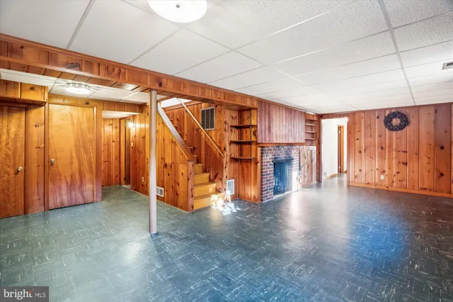 a view of room with window and hallway