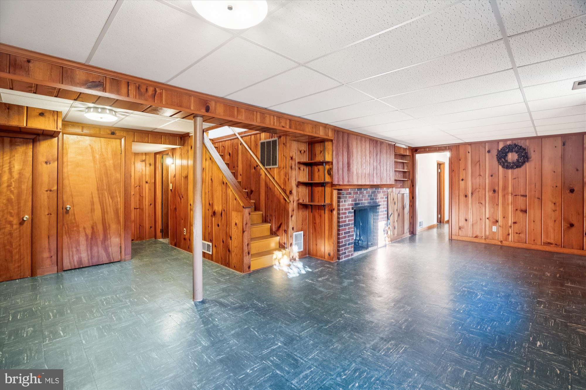 1912 Kimberly Road Silver Spring, MD 20903 - Photo 30 of 45 a view of an empty room with wooden walls