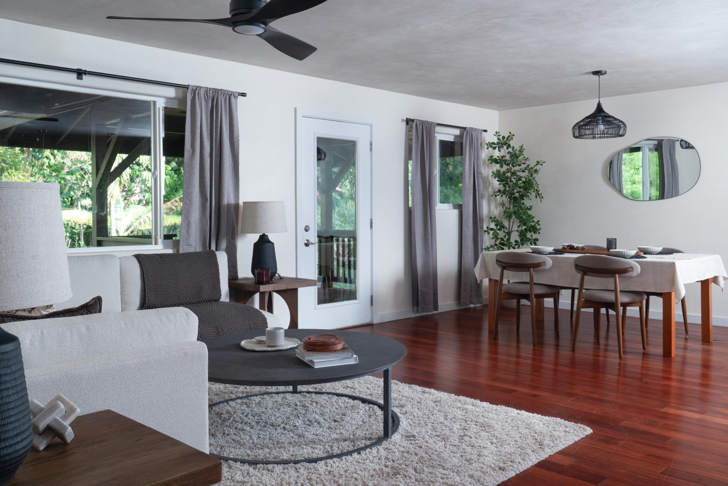 4509 Opana Place Haiku, HI 96708 - Photo 11 of 31 a living room with furniture a window and a table