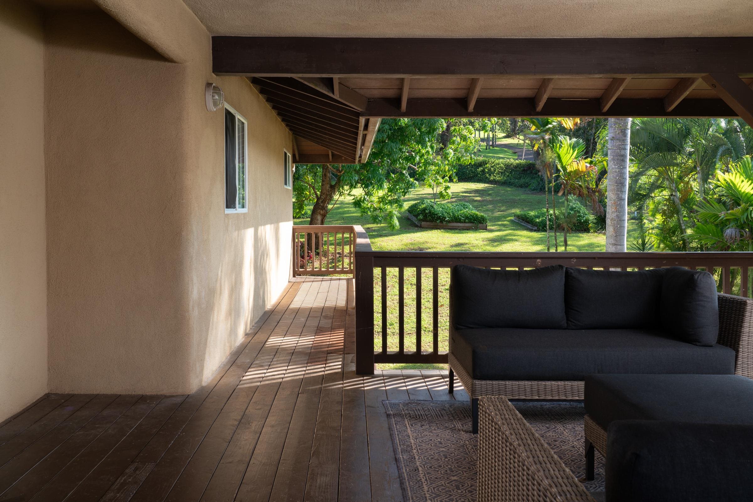 4509 Opana Place Haiku, HI 96708 - Photo 19 of 31 a view of outdoor space with deck and wooden floor