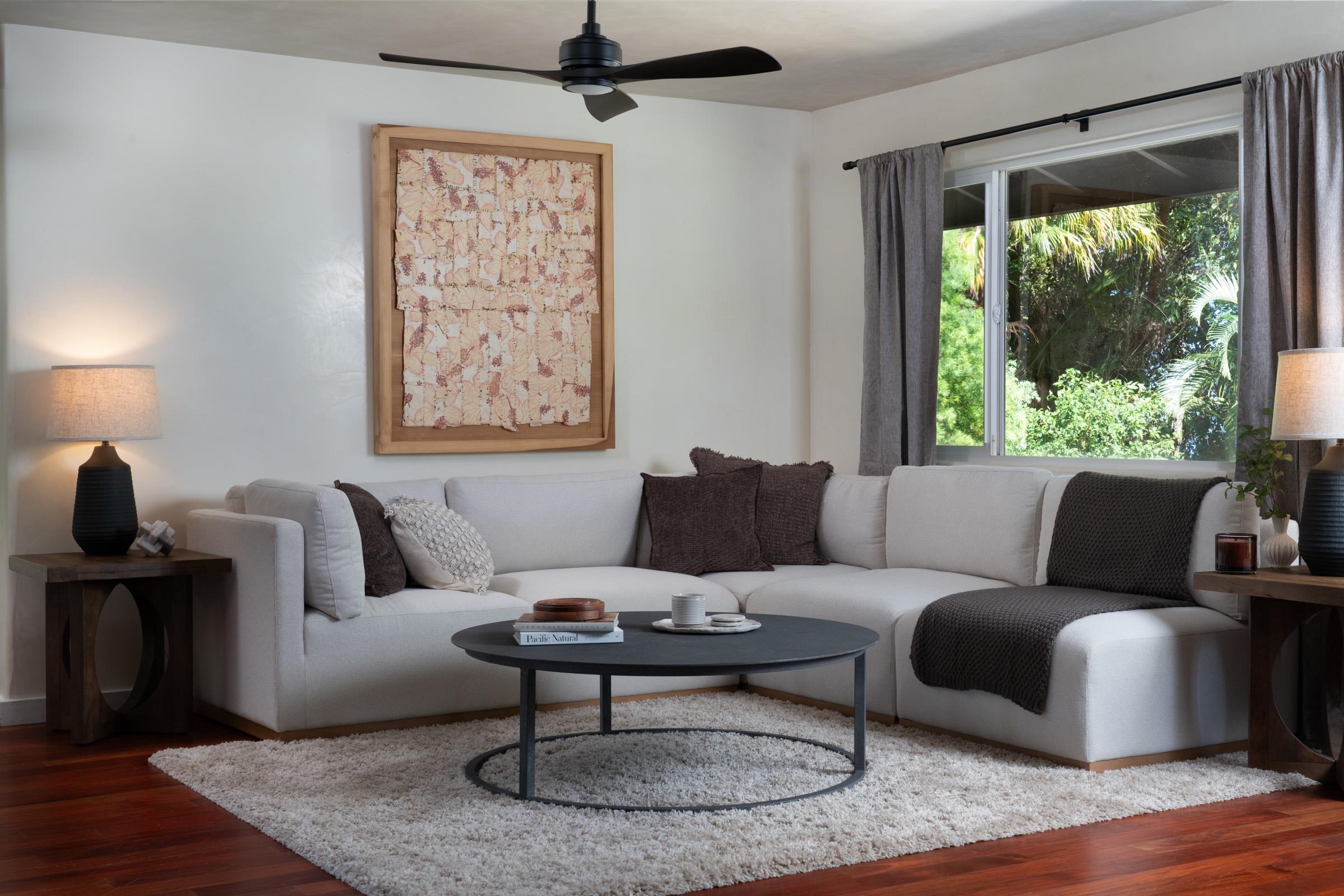 4509 Opana Place Haiku, HI 96708 - Photo 7 of 31 a living room with furniture and a window