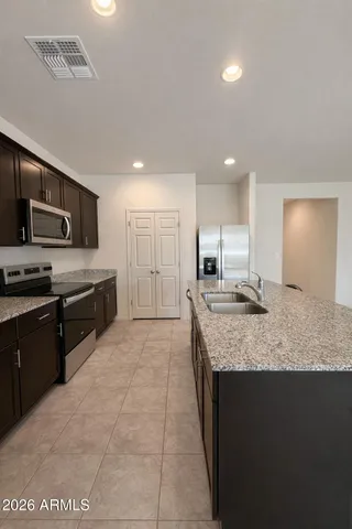 a utility room with washer and dryer